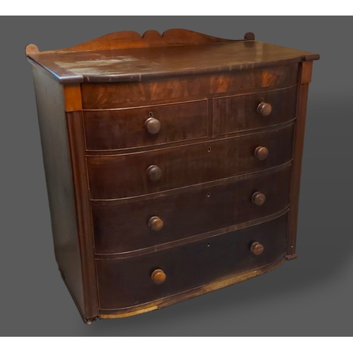 255 - A Victorian mahogany semi bow fronted chest of two and three long drawers, 111cms wide, 56cms deep a... 