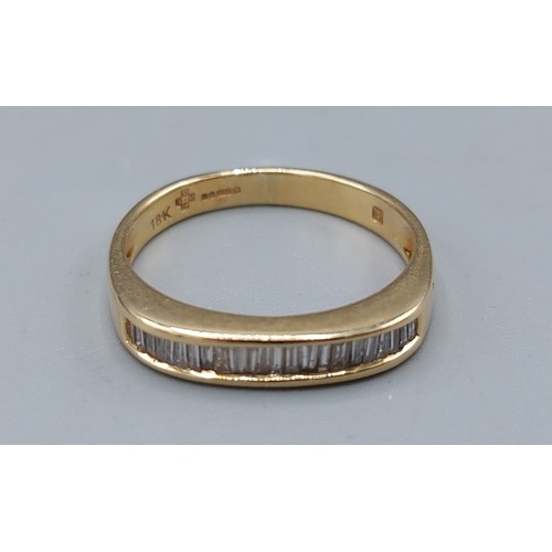 126 - An 18ct gold Baguette Diamond half Eternity ring, 3.9gms, ring size P