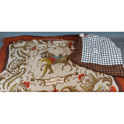 203 - A Hermes Paris, Cheval Turc scarf, together with a Yves Saint Laurent silk scarf