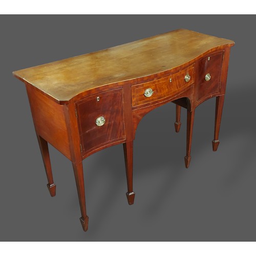 274 - A mahogany serpentine sideboard with a central drawer flanked by cupboard doors with brass handles r... 