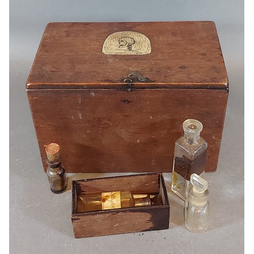 222 - A mahogany cased Apothecary box containing glass botles