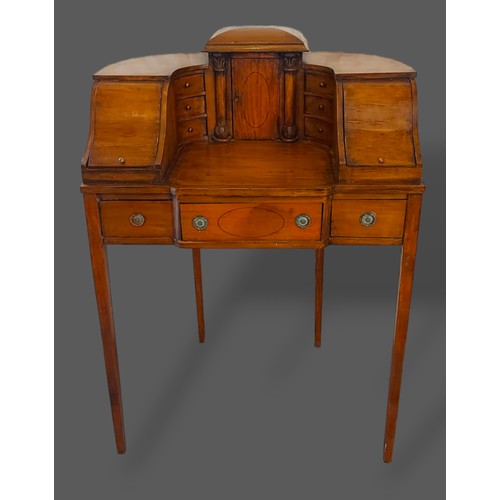 301 - A Sheraton revival, Carlton House style desk, the super structure with an arrangement of cupboards a... 