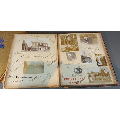 270 - A photgraph album containing early photographs to include The Royal Procession and many others toget... 