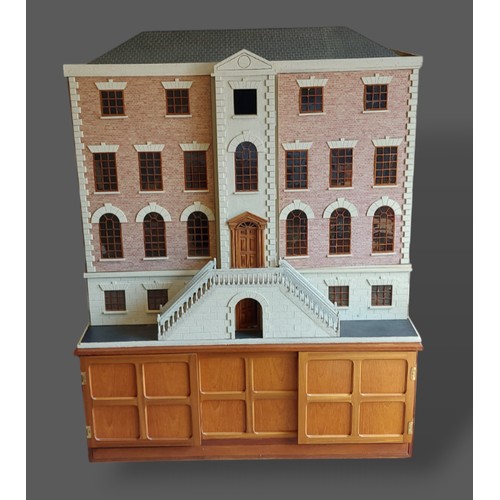 284 - A large dolls house in the form of a Georgian mansion with lighting, furniture and accessories, 120c... 
