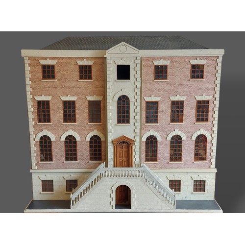 284 - A large dolls house in the form of a Georgian mansion with lighting, furniture and accessories, 120c... 