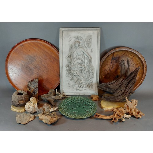 291 - A group of four carved moulds together with other items to include driftwood