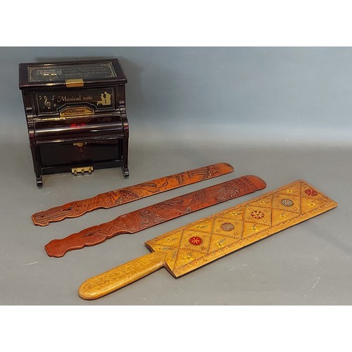 295 - A Tunbridge ware page turner together with two other page turners and a music jewellery box in the f... 