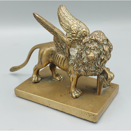 303 - The Lion of St Mark brass sculpture, 10cms tall
