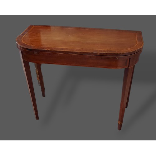 390 - A 19th Century mahogany card table, the hinged top with baize lined interior raised upon square tape... 