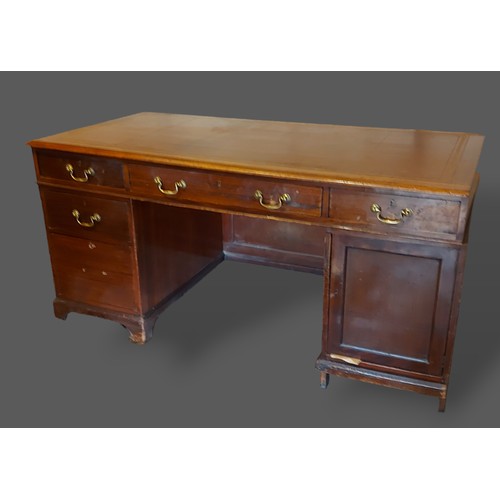 437 - DONATE 

A 19th Century mahogany twin pedestal desk, the tooled leather inset top above an arrangeme... 