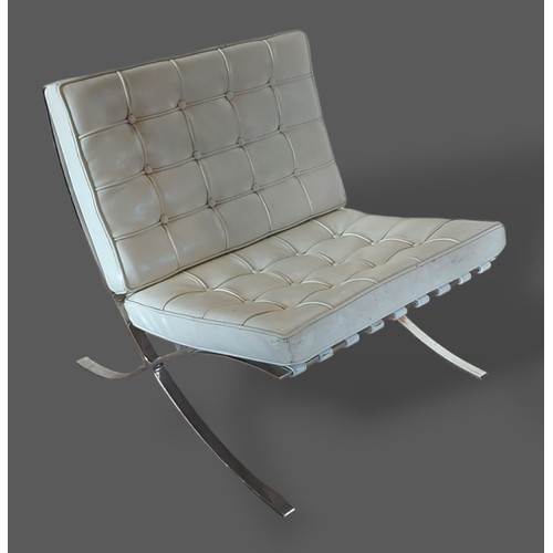 438 - In the style of Ludwig Mies Van Der Rohe for Knoll a chrome and leather upholstered chair