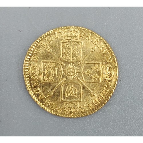 174 - A George I Gold Quarter Guinea, dated 1718, 2.1gms