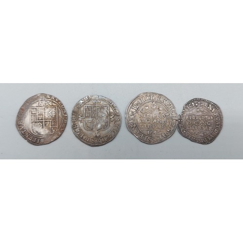 206 - A James I Silver Sixpence together with three Charles I Silver Sixpence