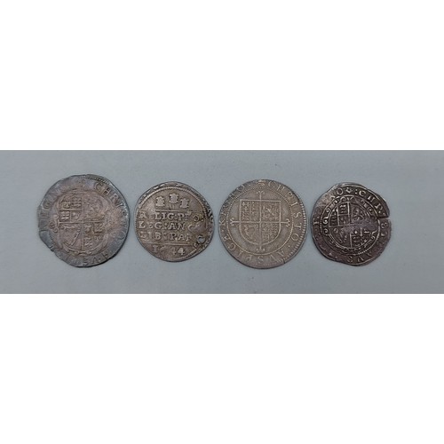 207 - A Charles I Silver Sixpence together with three similar Charles I Silver Sixpence