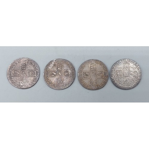 209 - A William III Silver Shilling dated 1696 together with another similar, a Queen Anne silver Shilling... 