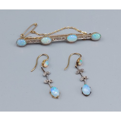 54 - An early 20th Century 15ct gold bar brooch mounted with four oval Opals interspaced with Diamonds to... 