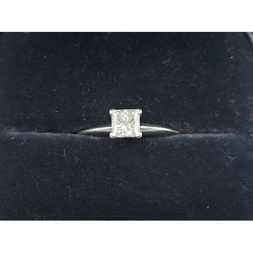 80 - Tiffany and Co. A Platinum solitaire Diamond ring, square shape and modified brilliant cut, colour g... 