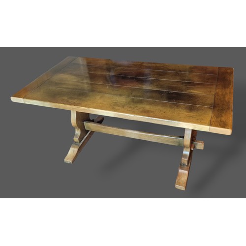 385 - An oak refectory style dining table, the plank top above twin end supports together with a set of si... 