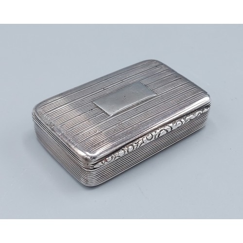 108 - A George IV silver snuff box, the hinged cover enclosing a silver gilt interior, Birmingham 1829, ma... 