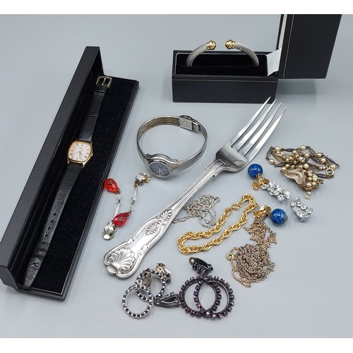 120 - A collection of jewellery to include various chains, a wristwatch and related