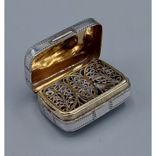 123 - A George III silver Vinaigrette, the hinged cover enclosing a silver gilt interior with pierced gril... 