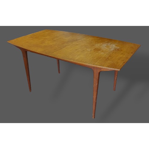 387 - A Mcintosh Circa 1960's extending dining table with integral leaf, 197cms x 91cms fully extended