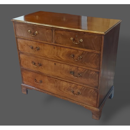 389 - A 19th Century mahogany straight front chest, the moulded top above two short and three long drawers... 