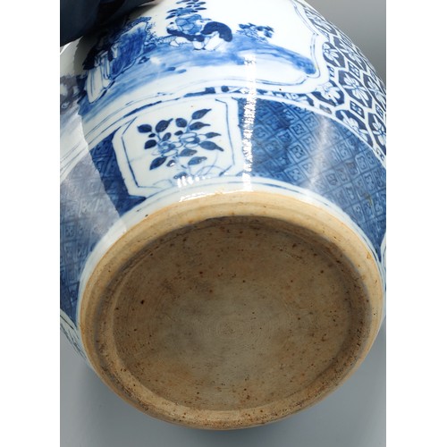 6 - A Chinese jardiniere decorated underglaze blue with reserves depicting figures within landscapes, 25... 