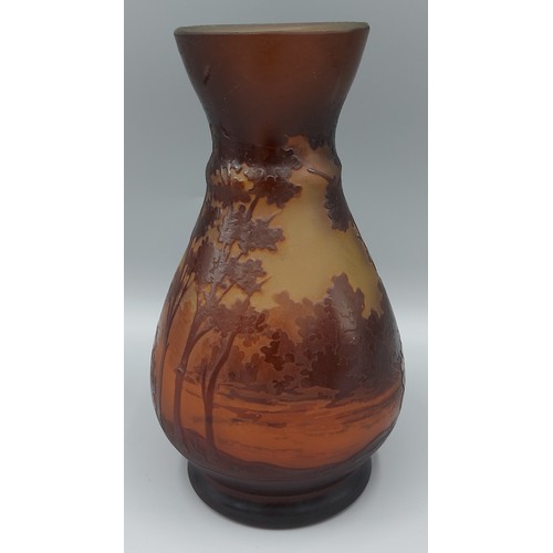 22 - Émile Gallé  a cameo glass vase decorated with a landscape and trees, signed Galle, 16.5cms tall