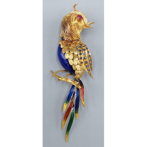 224 - An 18ct gold and enamel brooch in the form of a bird set with a Ruby eye and Sapphires, 17.8gms, 8.5... 