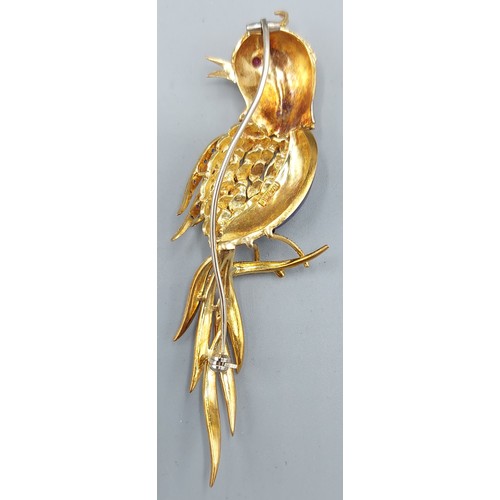 224 - An 18ct gold and enamel brooch in the form of a bird set with a Ruby eye and Sapphires, 17.8gms, 8.5... 