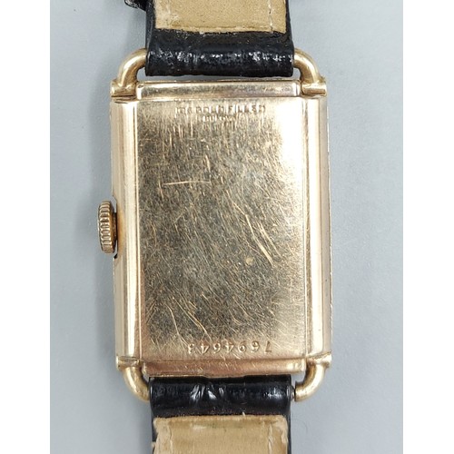 273 - A Bulova gold plated Tank watch with leather strap