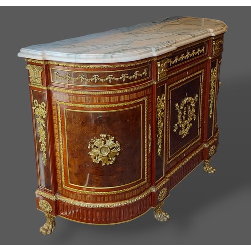 466 - A French Credenza cabinet, the marble top above a gilt metal inlaid frieze with central drawers flan... 