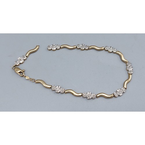 83 - A 10ct gold and diamond set linked bracelet, af, 4.3gms