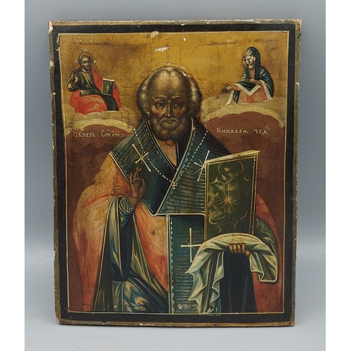 143 - A Russian silver mounted Icon, 22cms x 18cms together with another hand painted icon