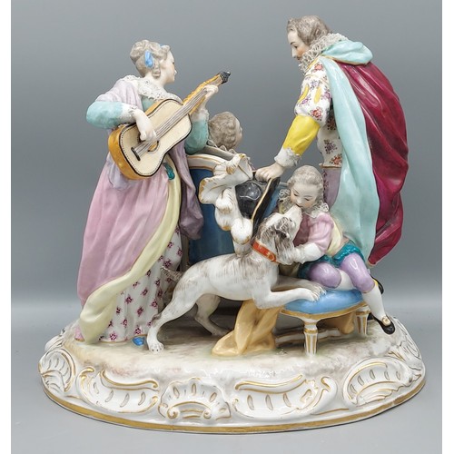 7 - A German porcelain large group mounted with figures decorated in polychrome enamels and highlighted ... 