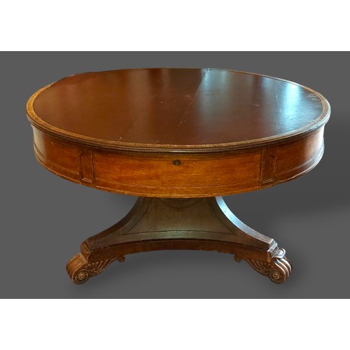 220 - A William IV oak drum centre table, the top with one frieze drawer above a triangular centre column ... 