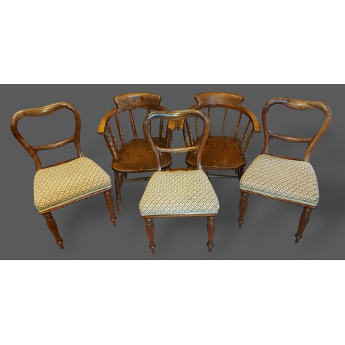 221 - A set of three Victorian mahogany dining chairs together with a pair of Victorian Captains armchairs