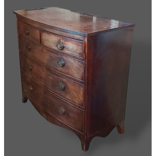 213 - A 19th Century bow fronted chest of two short and three long drawers with out swept legs, 110cms wid... 