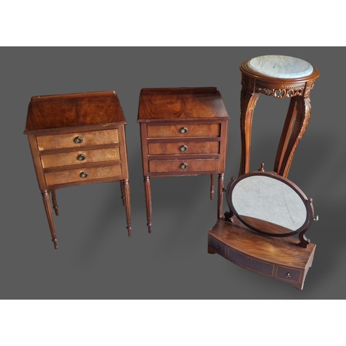 251 - A pair of mahogany three drawer bedside chests together with a 20th Century marble topped jardinier ... 