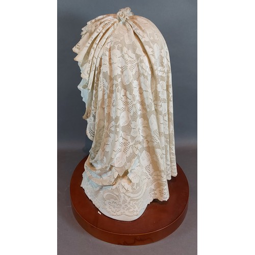 27 - A Lladro bust with Mantilla on wooden plinth, 36cms tall