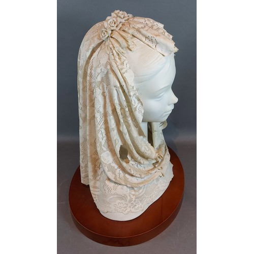 27 - A Lladro bust with Mantilla on wooden plinth, 36cms tall