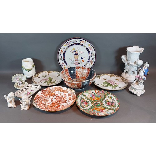 29 - A German porcelain figure together with other ceramics to include an Imari bowl