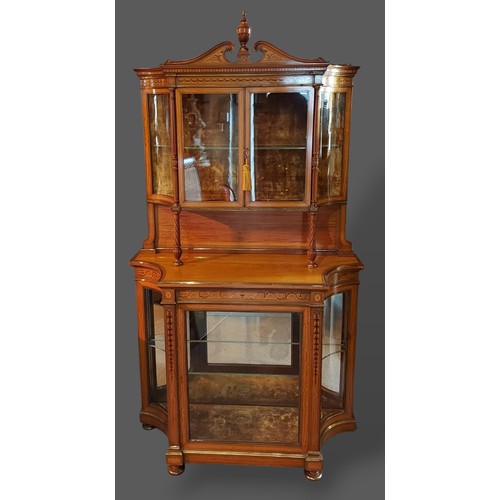 252 - An Edwardian Sheraton revival marquetry inlaid and gilt metal mounted cabinet, the swan neck pedimen... 