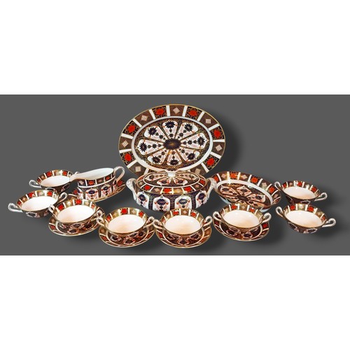 31 - A Royal Crown Derby oval platter decorated in the Imari palette together with a similar entree dish ... 