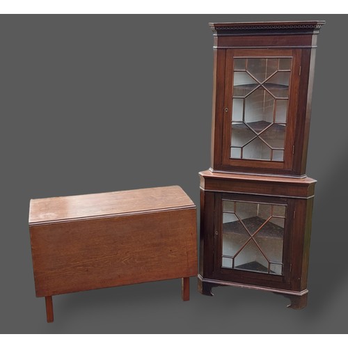 262 - A 19th Century mahogany standing corner cabinet together with a 19th Century mahogany drop flap dini... 