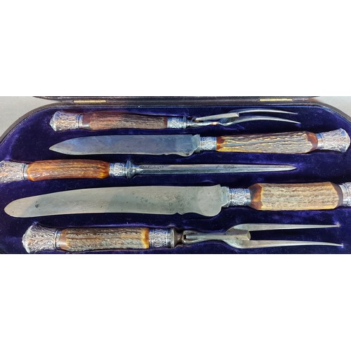 98 - A 19th Century five piece carving set with horn handles and silver collars, the fitted case inscribe... 