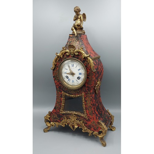 194 - A French Boulle and gilt metal mounted mantle clock with figural cresting, the enamel dial inscribed... 