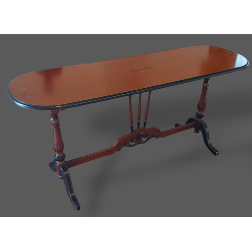 278 - A 20th Century painted serving table, the moulded top above twin end supports with out swept legs, 1... 