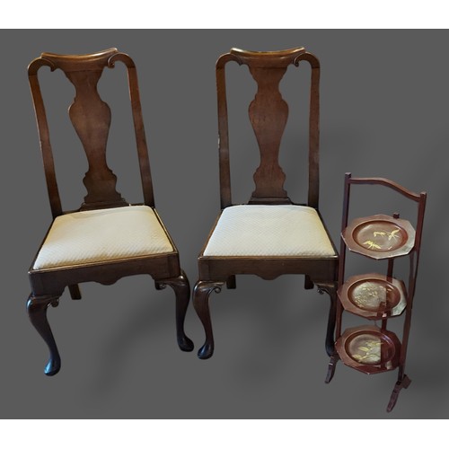 283 - A Pair of Queen Anne style dining chairs together with a lacquered cake stand and an African carved ... 